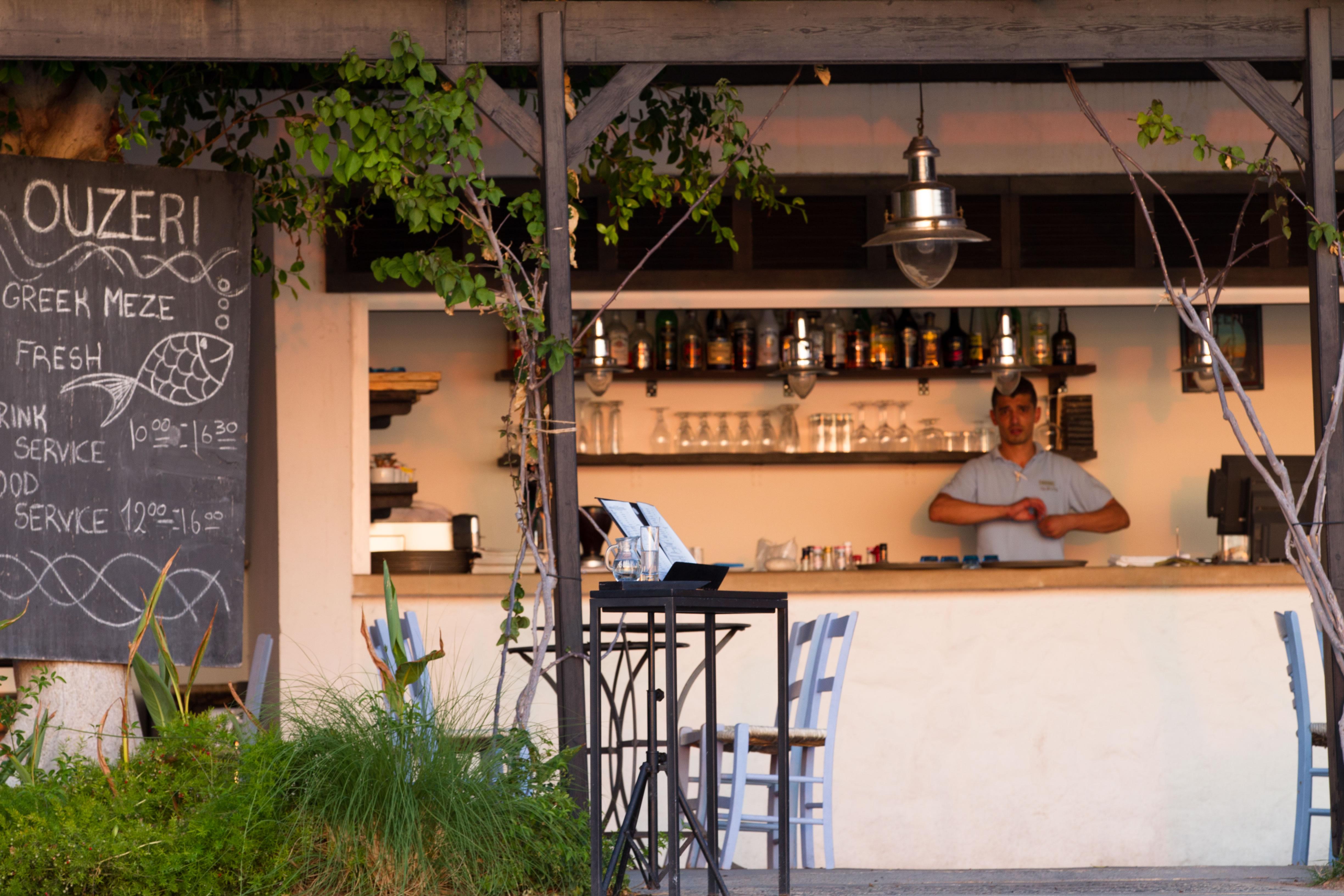 Almyra Hotel Pafos Exterior foto A tavern in Athens
