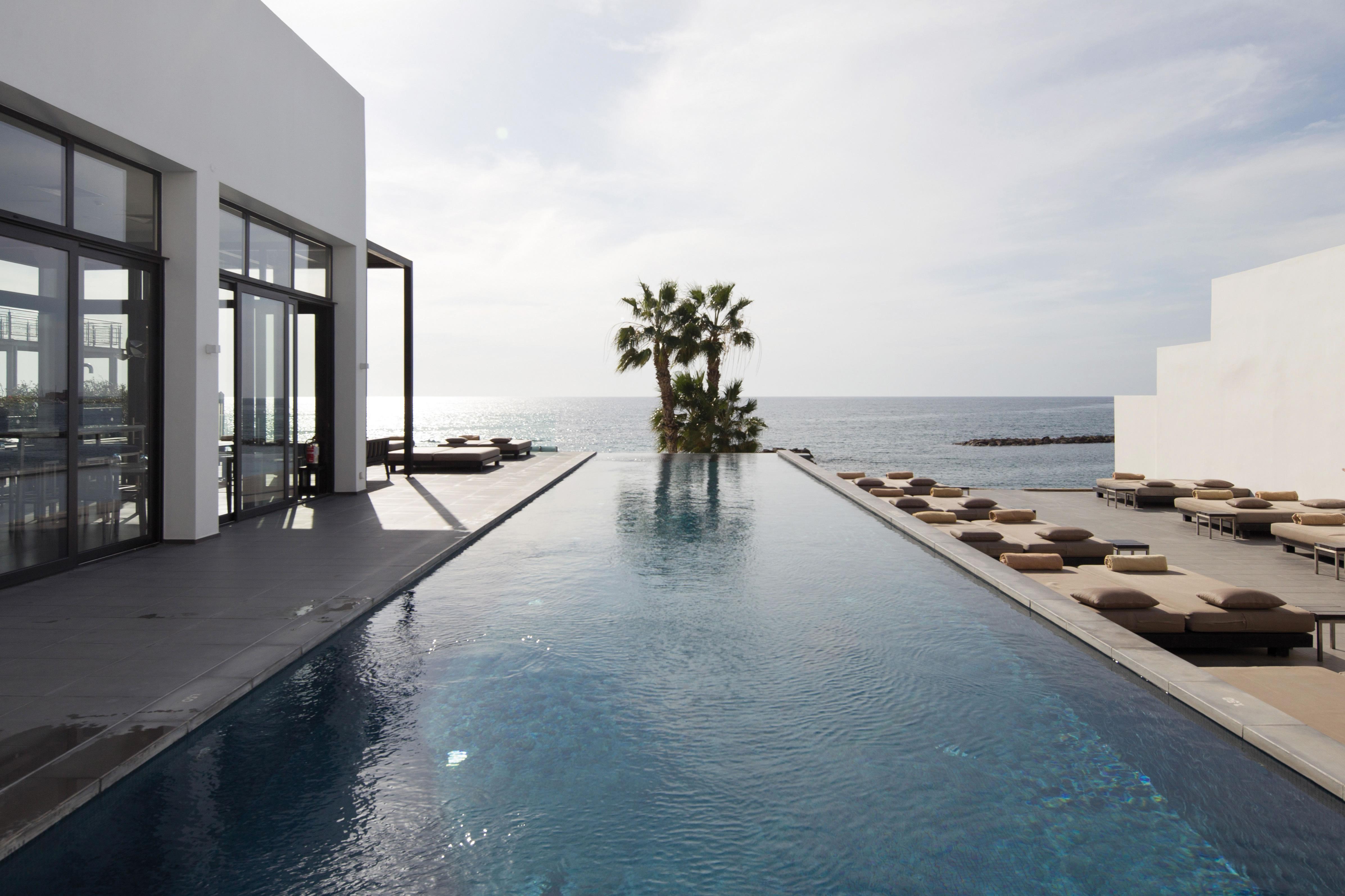 Almyra Hotel Pafos Exterior foto The pool at the Hotel